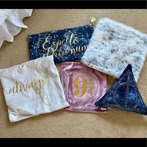 Five Pottery Barn Teen Harry Potter pillow covers.